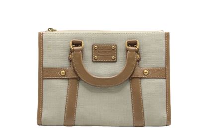 LOUIS VUITTON. Sac à main en chèvre beige...