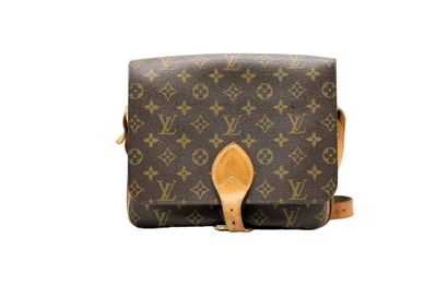 LOUIS VUITTON. Sac cartouchière en toile...