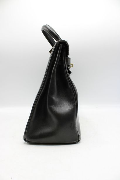 HERMES. Sac Kelly 32 retourné en cuir noir,...