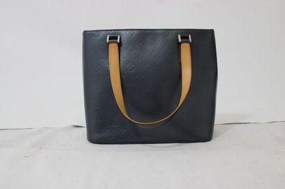 LOUIS VUITTON. Sac à main en cuir monogramme...