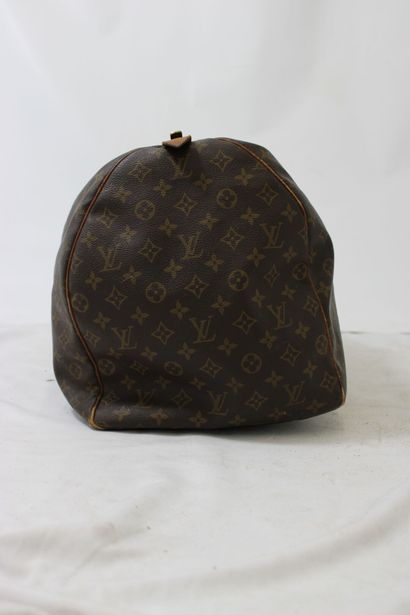 LOUIS VUITTON. Sac Keepall 60 en toile monogramme...