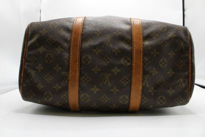 LOUIS VUITTON. Sac Keepall en toile monogramme...