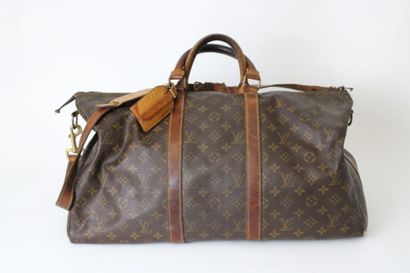 LOUIS VUITTON. Sac Keepall en toile monogramme...