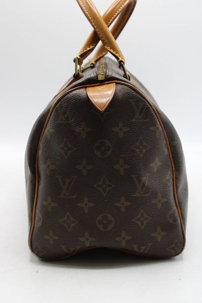 LOUIS VUITTON. Sac Speedy 30 en toile monogramme...