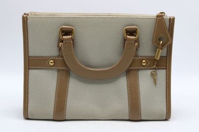 LOUIS VUITTON. Sac à main en chèvre beige...