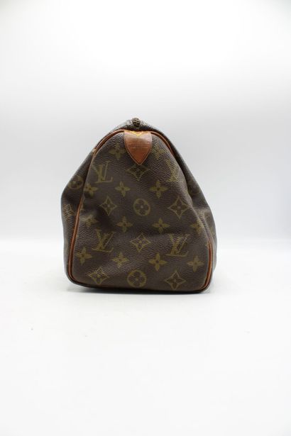 LOUIS VUITTON. Sac Speedy 25 en toile monogramme...