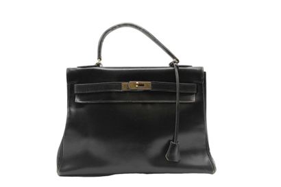 HERMES. Sac Kelly 32 retourné en cuir noir,...