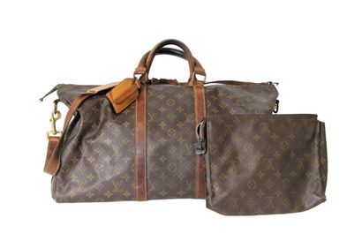 LOUIS VUITTON. Sac Keepall en toile monogramme...