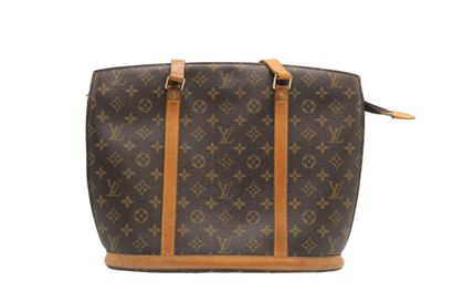 LOUIS VUITTON. Sac Babylone en toile monogramme...