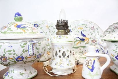 MOUSTIER. Earthenware service with polychrome...