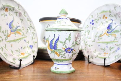 MOUSTIER. Earthenware service with polychrome...