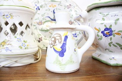 MOUSTIER. Earthenware service with polychrome...