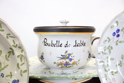 MOUSTIER. Earthenware service with polychrome...