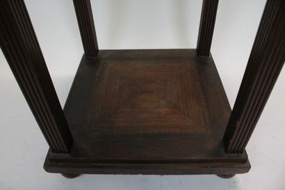 Stained walnut saddle with two crotch shelves...