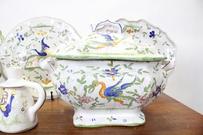 MOUSTIER. Earthenware service with polychrome...