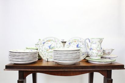 MOUSTIER. Earthenware service with polychrome...