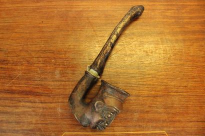 AFRICA. Meeting of two bronze pipes decorated...