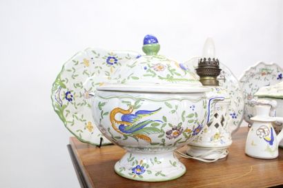 MOUSTIER. Earthenware service with polychrome...