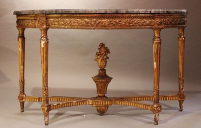 Half-moon console in carved and gilded wood...