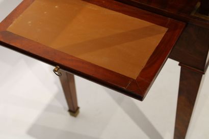 Tronchin style table in flamed mahogany veneer...