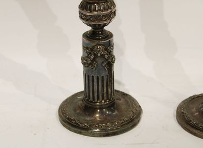Pair of Louis XVI style candlesticks in silver...