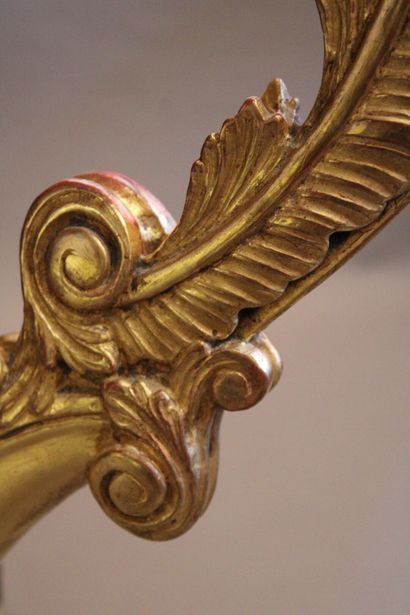 Transition style console in carved and gilded...