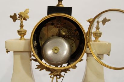 A Louis XVI style portico clock in white...