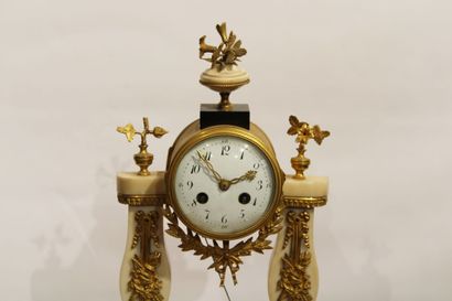 A Louis XVI style portico clock in white...