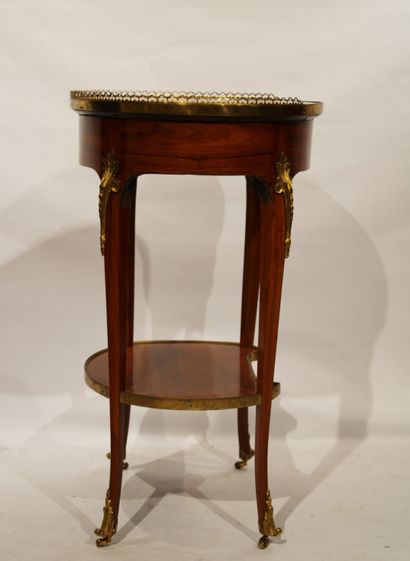 Elegant flying table of oval shape decorated...