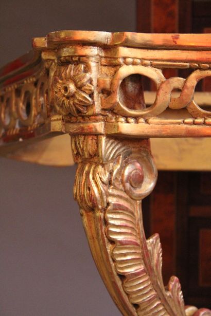 Transition style console in carved and gilded...