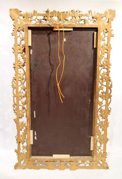 Louis XVI style mirror in carved and gilded...