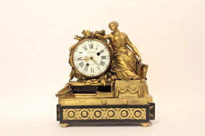 A Louis XVI style chased and gilded bronze...