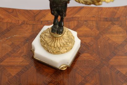 A pair of Louis XVI style candelabras with...
