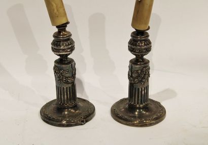 Pair of Louis XVI style candlesticks in silver...