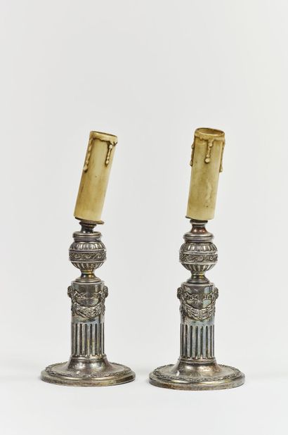 Pair of Louis XVI style candlesticks in silver...