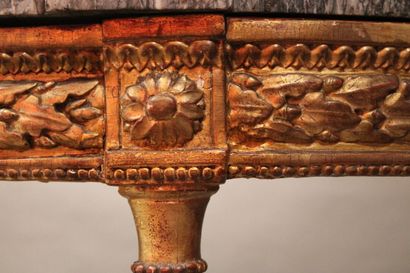 Half-moon console in carved and gilded wood...