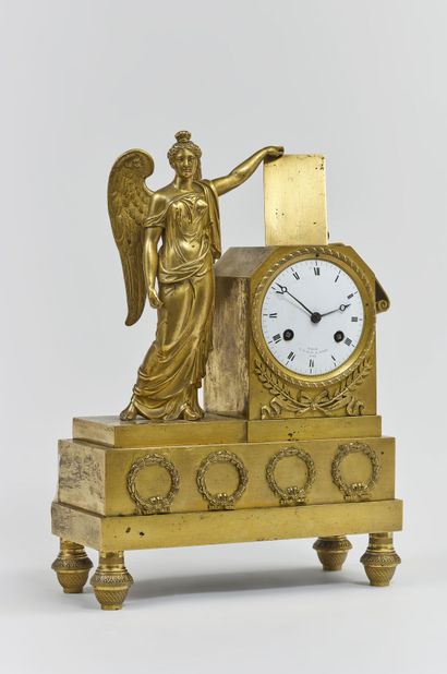 Louis XVI style clock in chased and gilded...