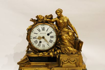 A Louis XVI style chased and gilded bronze...