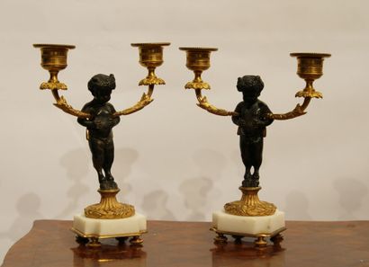 A pair of Louis XVI style candelabras with...