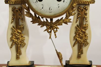 A Louis XVI style portico clock in white...