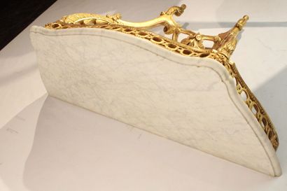 Transition style console in carved and gilded...