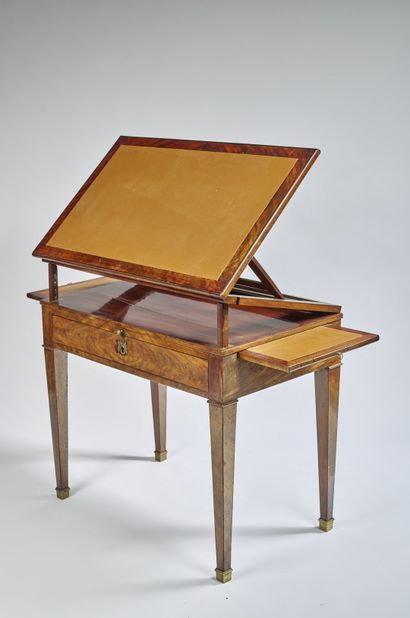Tronchin style table in flamed mahogany veneer...