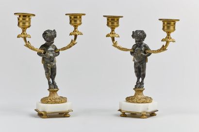 A pair of Louis XVI style candelabras with...