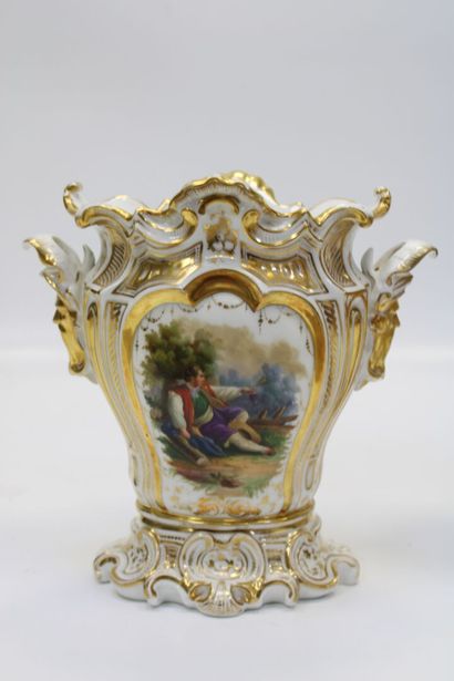 Pair of Paris porcelain vases, each resting...