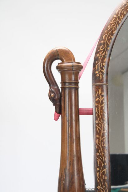 Large mahogany psyche mirror. Curved pediment,...
