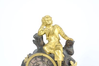 Gilt bronze and patinated clock decorated...