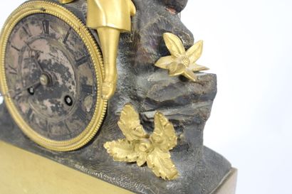 Gilt bronze and patinated clock decorated...