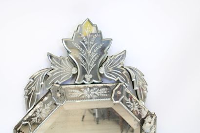 Octagonal Venetian mirror with engraved pediment...