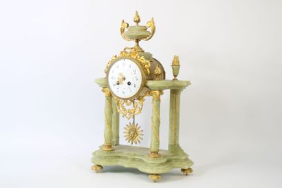 Hardstone and bronze portico clock decorated...