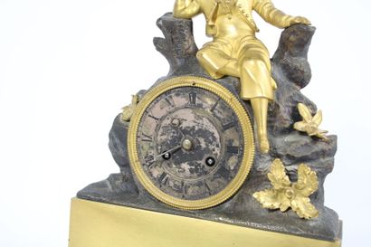 Gilt bronze and patinated clock decorated...